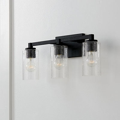 Ravenwood 3-Light Vanity – Black Iron Finish with Clear Seeded Glass