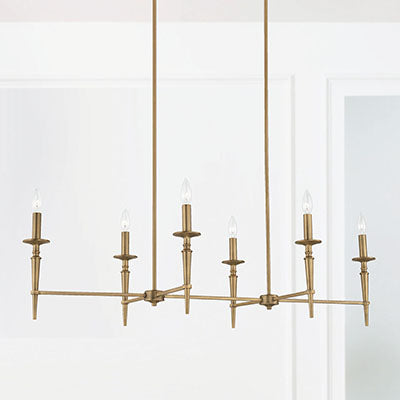 Abbie 6-Light Linear Chandelier in Aged Brass with White Fabric Shades